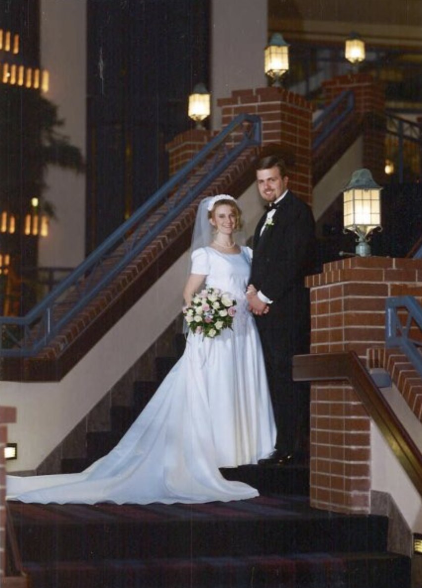 Suzanne and Mike's wedding portrait on a grand staircase
